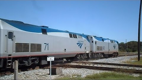 Amtrak Train Almost Slices Through CSX Tropicana Juice Train