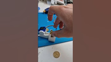 coin dispenser mechanism (but multiple coins on top of each other)