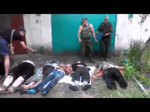 Убитые жители Первомайска после обстрелов украинской армией 2014 08 06