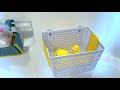 Retractable multiuse poolside storage basket