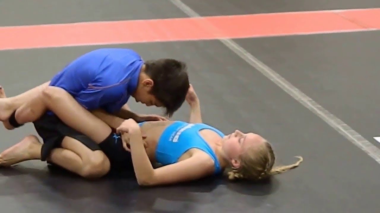 2 girls wrestle guy