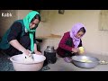 Village life Afghanistan: Baking Bread in old tanor in mountains village afghanistan