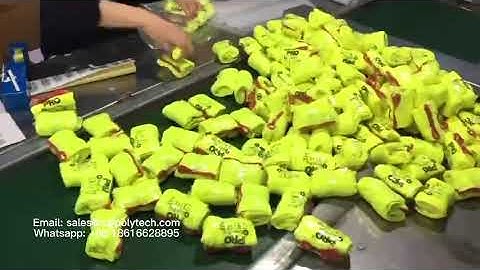 Automatic L bar shrink wrapping machine for gloves