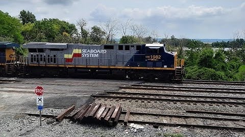 CSX Seaboard System Heritage Unit #1982 Leads I031 With Amtrak Racing
