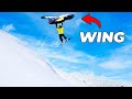 Snowboarder FLIES using a WING!