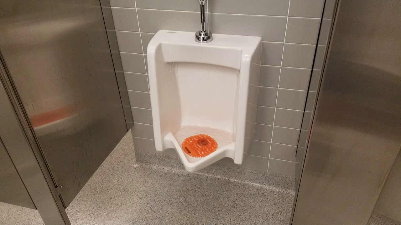 Continuously Flushing American Standard Urinal with Stuck Flushometer