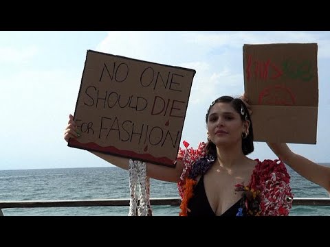 Activists denounce fast fashion in plastic catwalk protest in Tel Aviv