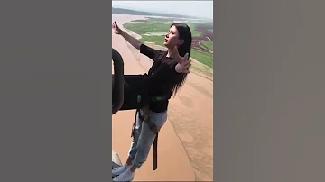 شابة كورية تجرب اخطر لعبة في العالم السقوط من الأعلى تجربة خطيرة 