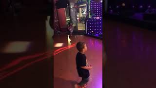 Boy dances in front of strobe lights then older sister accidentally runs into him