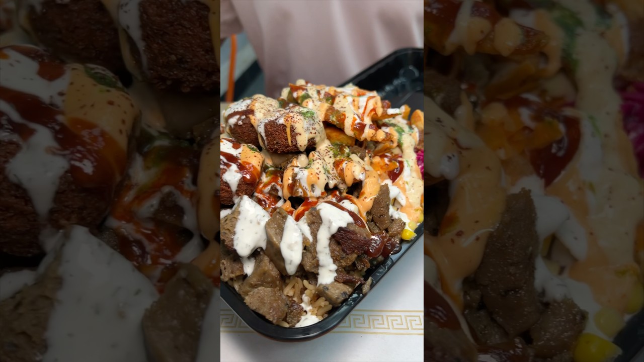 The GIANT MIXED HALAL PLATTER from Hunchos Halalspot in Astoria, Queens NYC! 🔥🔥 #DEVOURPOWER