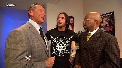 Mr. McMahon talks to General Manager Theodore Long