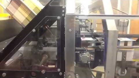 Spartan with Bucket Conveyor and Tamp for Pancake boxes