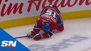 Jesperi Kotkaniemi Exits After Being Sent Head First Into The Ice By Nikita Zadorov