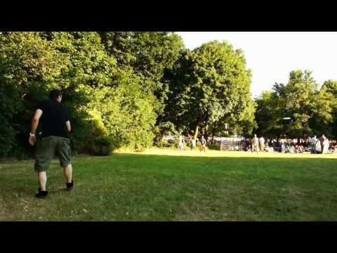 German Men play Frisbee on Very Hot Day