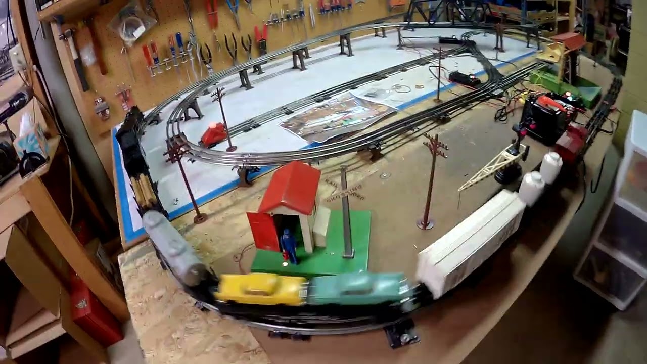 Reconditioned Postwar Lionel 4x8 smoking steam train set layout w/whistle, accessories, log loader