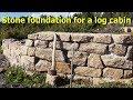 Stone foundation for a log cabin