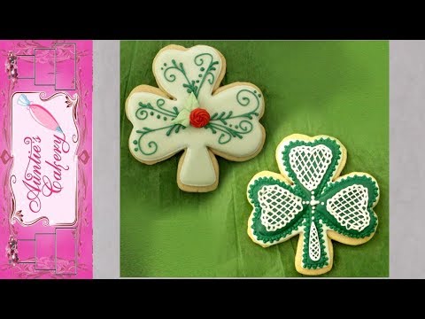 2 Shamrock sugar cookie designs with royal icing.