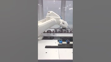 Cosmetic empty bottle robot hand pick feeding machine sorter line