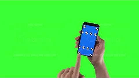 Man holds smartphone with tracking markers on display and swipes left then right on green screen