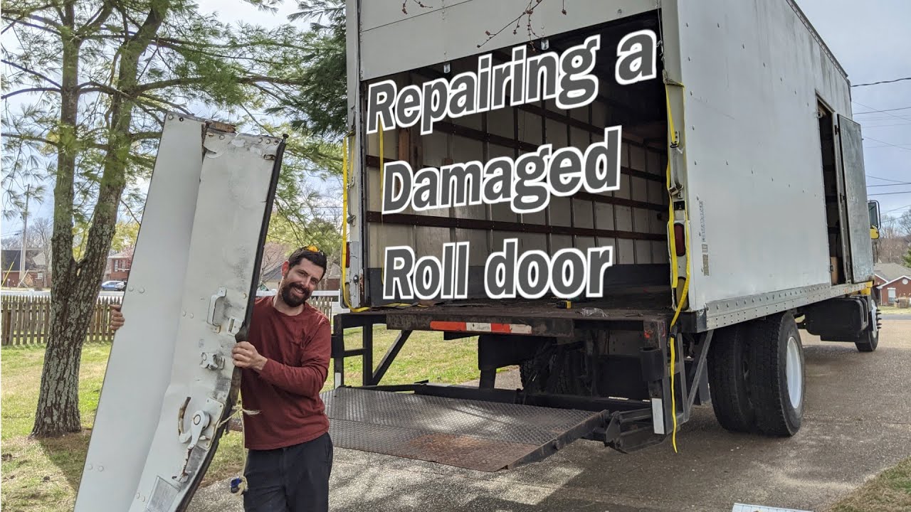Box truck roll door repair (rotted wood / jammed rollers)