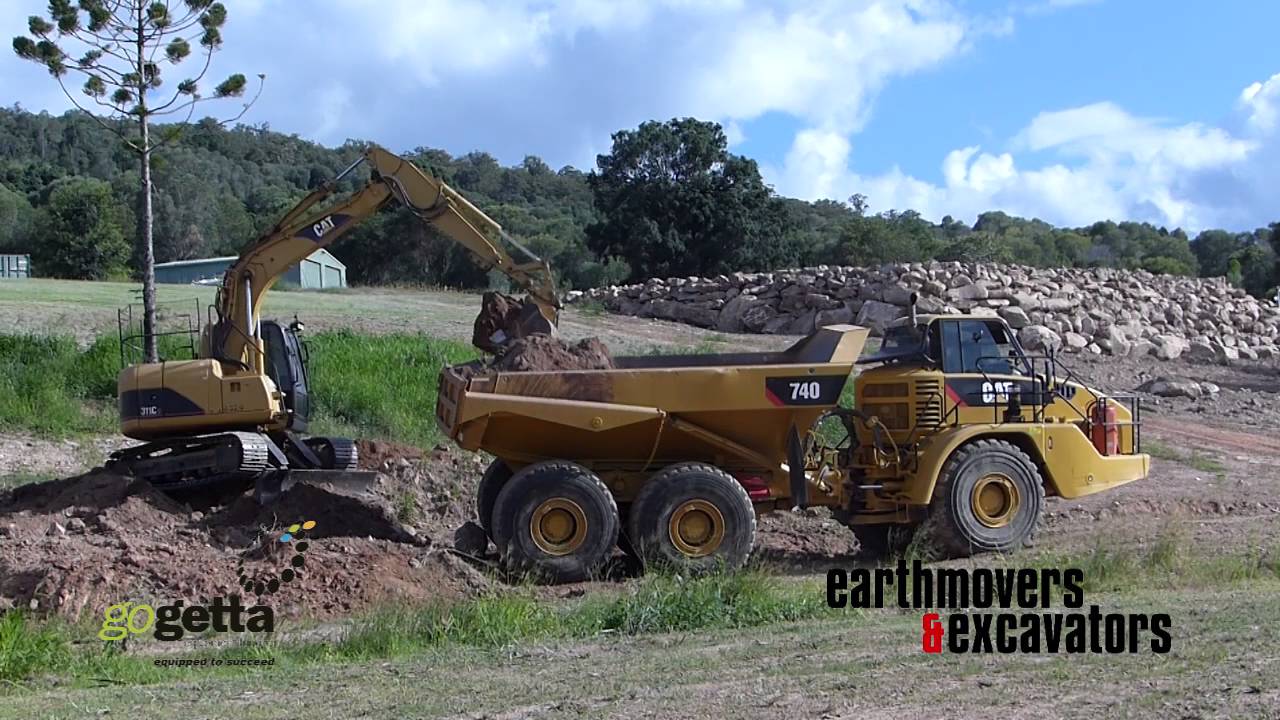 Cat 740 dump truck review Earthmovers Excavators YouTube