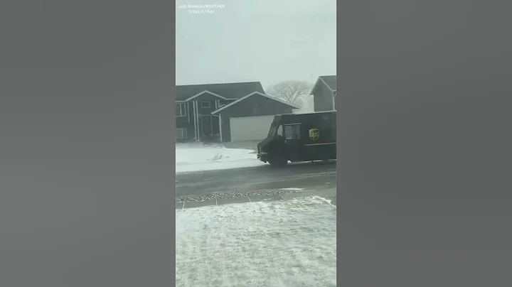 UPS Driver Delivering Package During South Dakota Blizzard