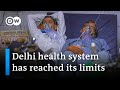 India: New Delhi locks down as COVID cases surge | DW News