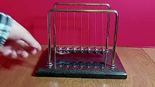 Fooling Newton's Cradle