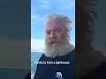 Man living alone in a stormy lighthouse