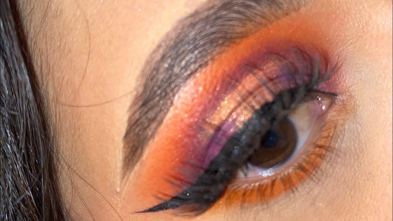 Orange and purple eyeshadow look 