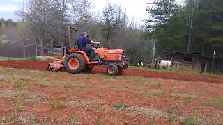 Kubota B7200 tilling the garden.....