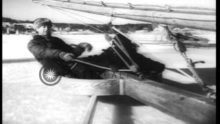 United States Coast Guard girls sail ice boats on snow covered surface in Boston. HD Stock Footage