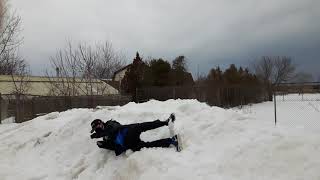 man falls in snow