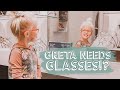 GRETA NEEDS GLASSES?