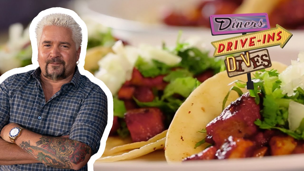 Guy Fieri Eats Some OUTSTANDING Al Pastor Tacos | Diners, Drive-Ins and Dives | Food Network