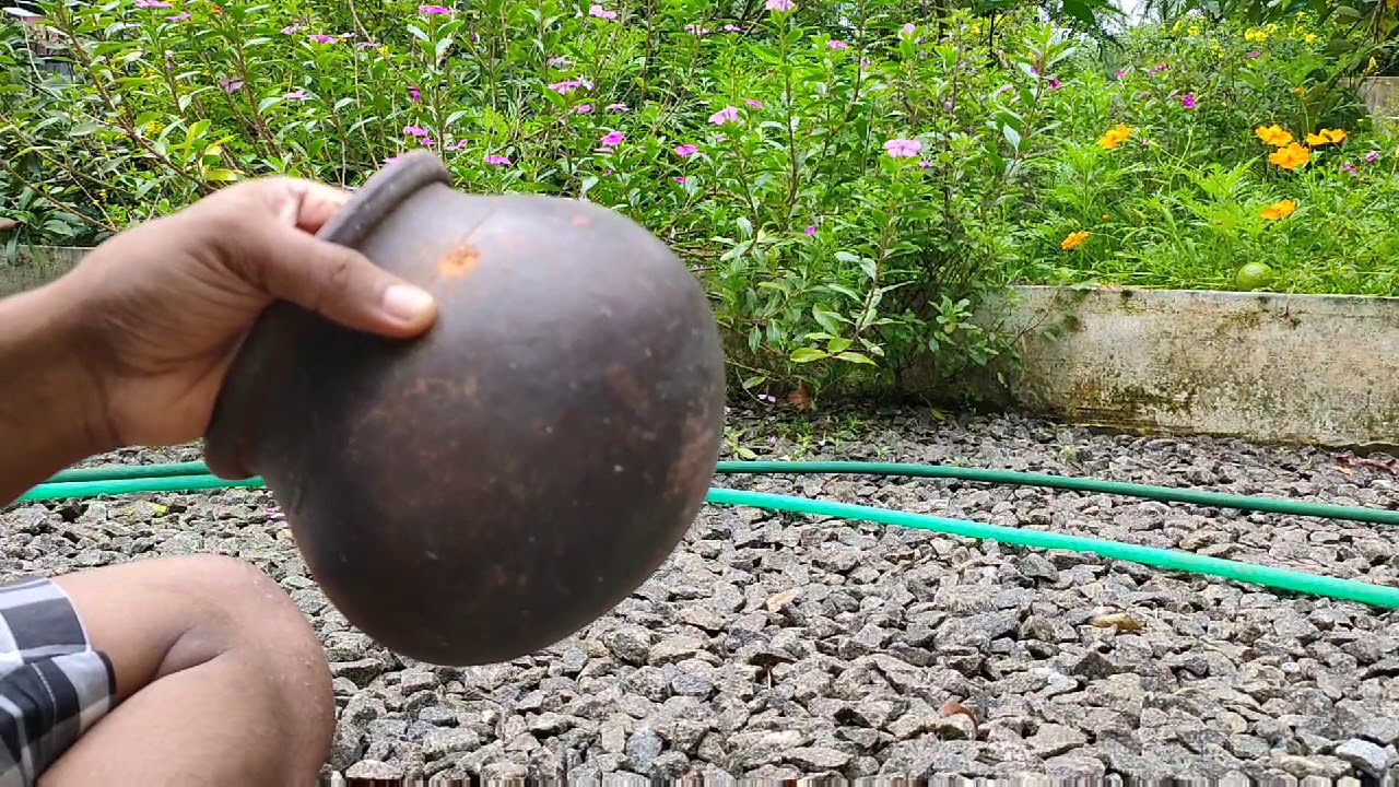 How to make hole on breeding pots/ clay pot in Malayalam . മണ്ണ്