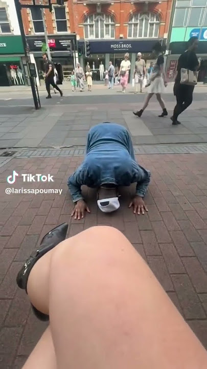 Femdom Public Humiliation: women laugh at kneeling man