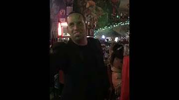 dart almost hits hand - 975697