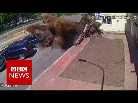 Dramatic Ukraine water pipe explosion captured on CCTV - BBC News