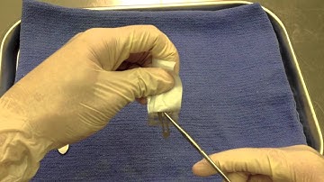 How do you put on a Scalpel Blade?