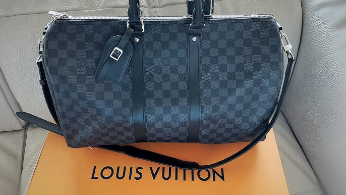 LOUIS VUITTON Damier Graphite Keepall Bandouliere 55 ❤ liked on