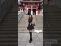 Sleek Black Dress Aesthetic with Knee-High Boots