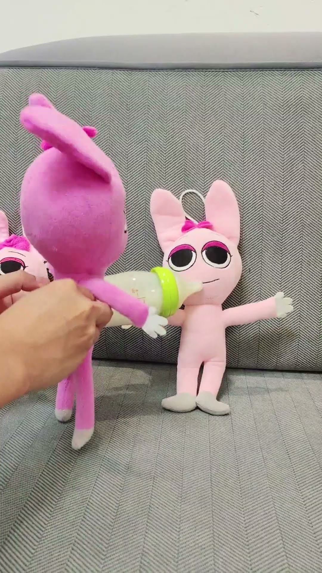 feeding crying Pinki with milk