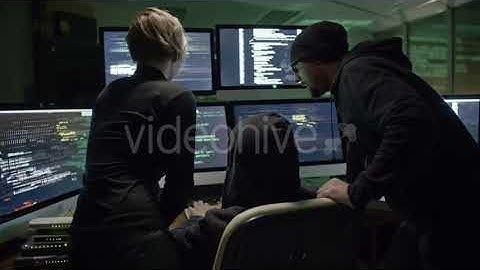 Programmers Writing Codes at Night