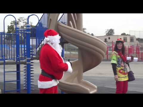 Santa makes a suprise visit to Cadman Elementary School riding his skateboard!