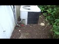 old ac system buried in dirt and mulch