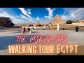4k egypt  going toward and leaving the pyramids inout  the giza pyramids