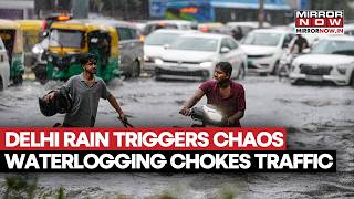 Delhi Witnesses Heavy Rain, Triggers Chaos Waterlogging Chokes Traffic, IMD Issues Red Alert