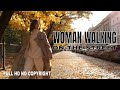 Royalty free woman walking on the street stock footage  woman stock footage no copyright