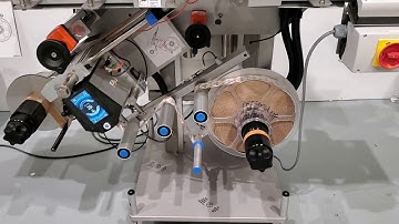 Clamshell closing & labeling system